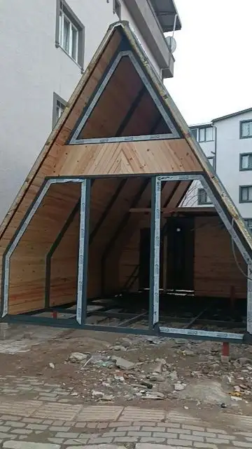 طراحی و ساخت کلبه چوب و فلز A شکل سوئیسی